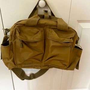Military Diaper Bag for Dads with Bottle Holder and Tactical Pockets.